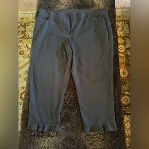 Lane Bryant black cropped slacks with ruffle edge.